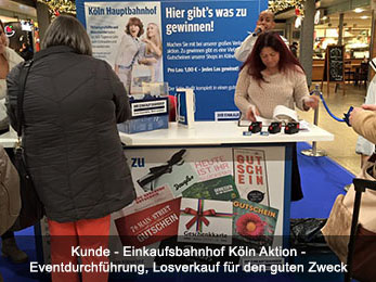 Kunde - Einkaufsbahnhof Köln Aktion - Eventdurchführung, Losverkauf für den guten Zweck